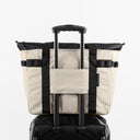 a studio shot of the back of Sand Tote Bag with the trolley sleeve