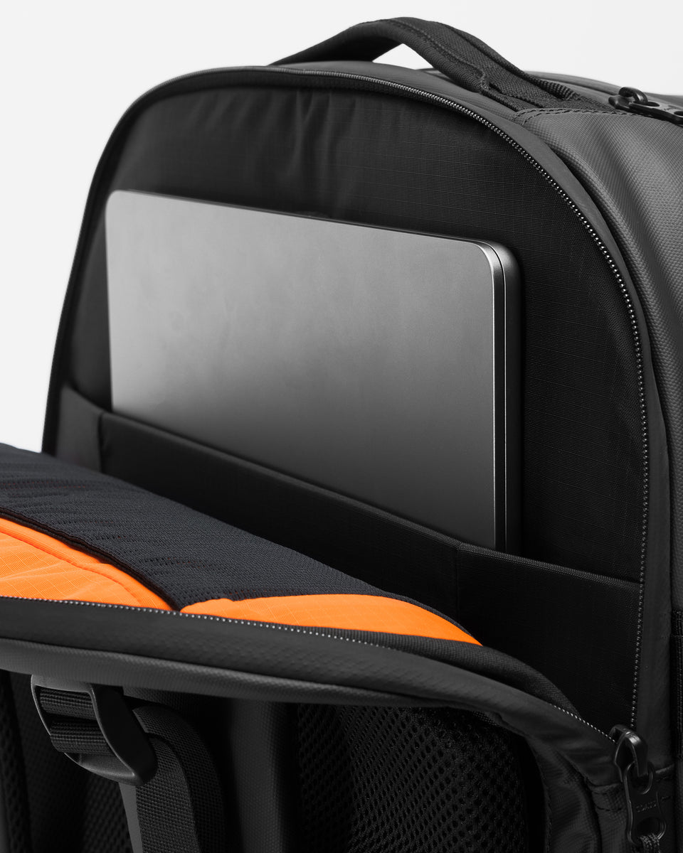 A studio shot showing the laptop compartment on the travel backpack 40l