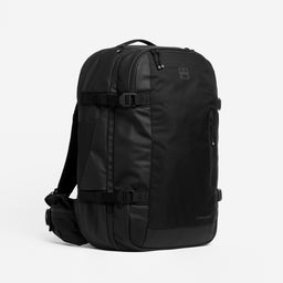 A studio shot of the front and waist strap on a Travel Backpack 40L in All Black