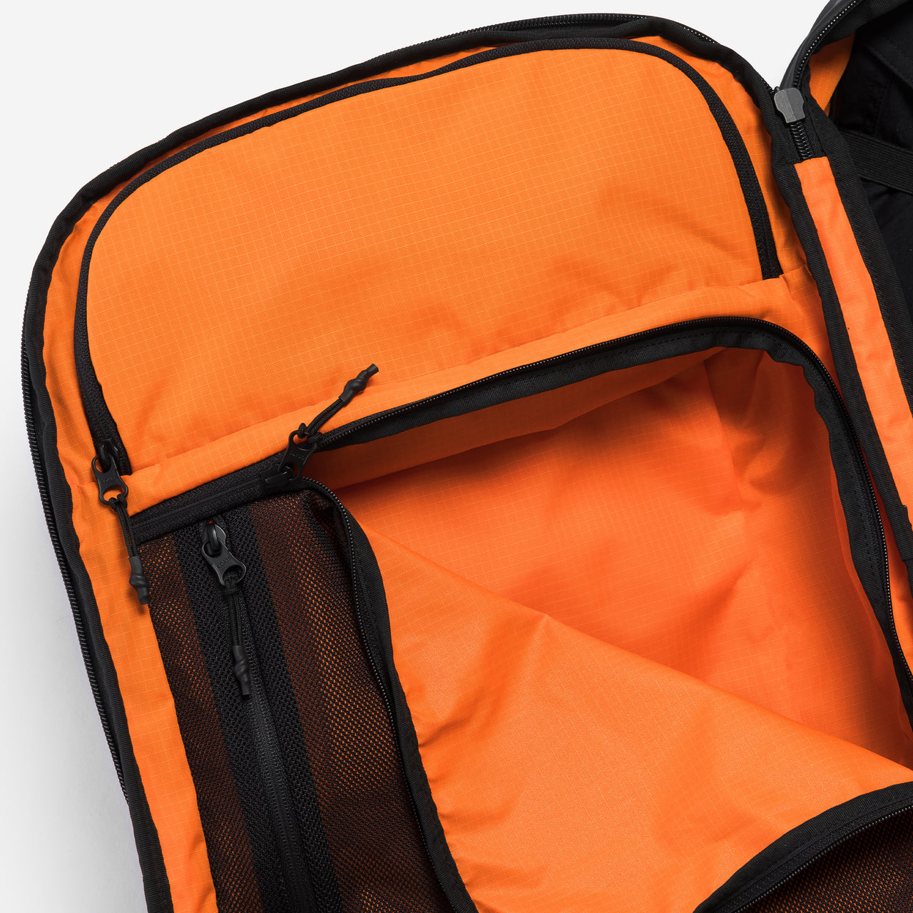 A studio shot of he interior of the Travel Backpack 40L in All Black