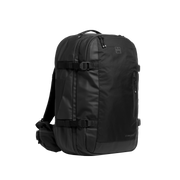 A studio shot of the front and side of an travel backpack 40l as cut out transparent PNG- black