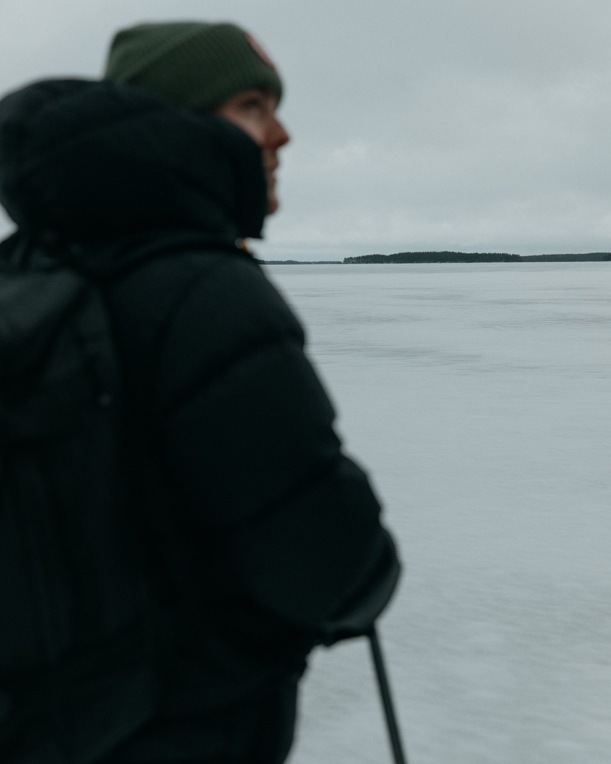 A man standing on a lake in Finland