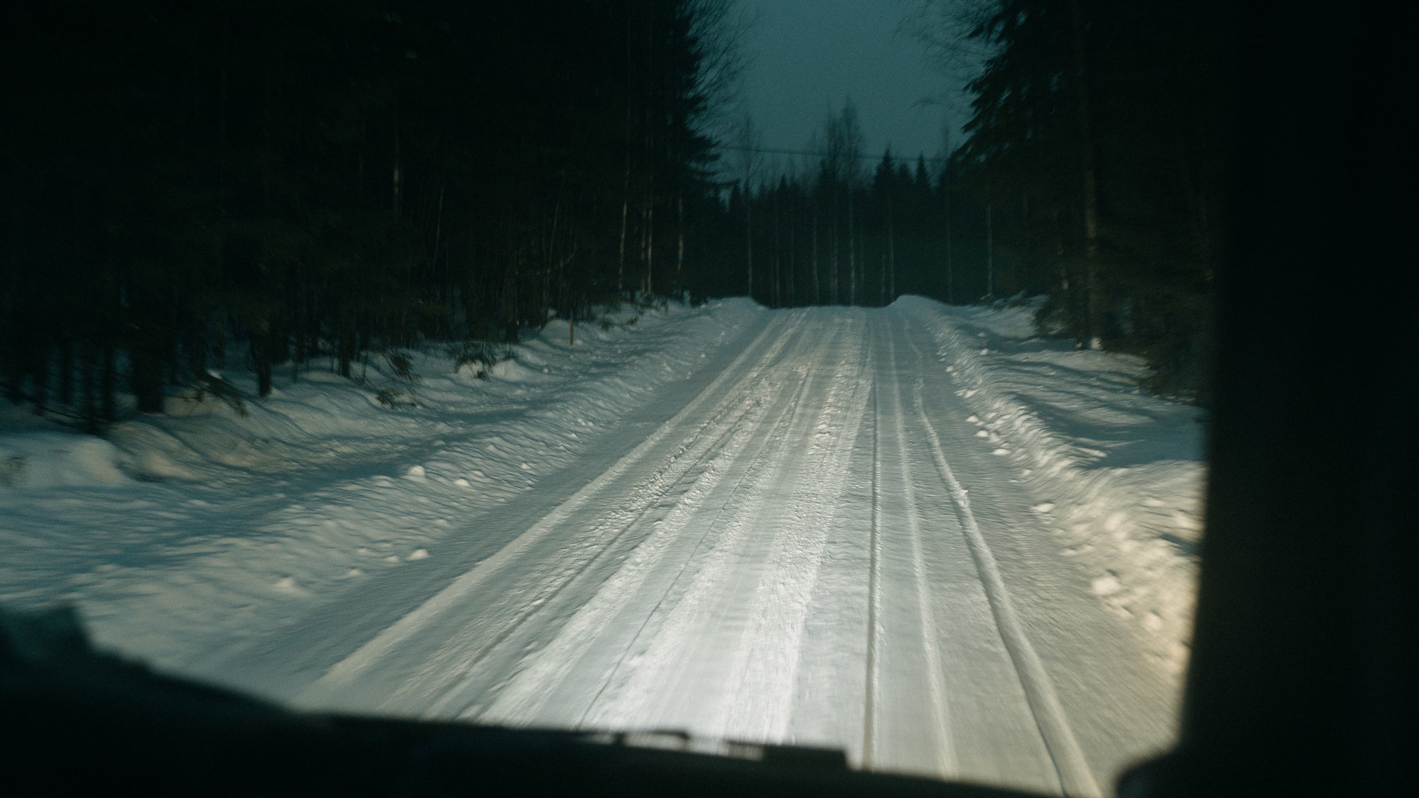 A snow covered road in Finland
