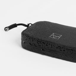 A studio of the waterproof materials on the wallet in All Black