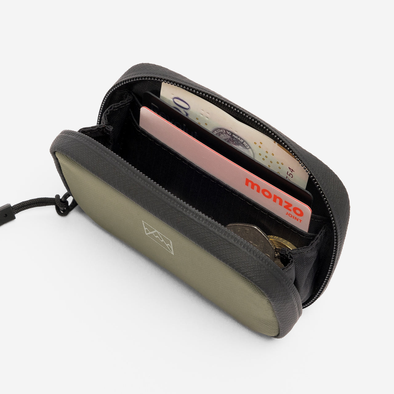 A studio shot of the interior of the Wallet in Urban Green