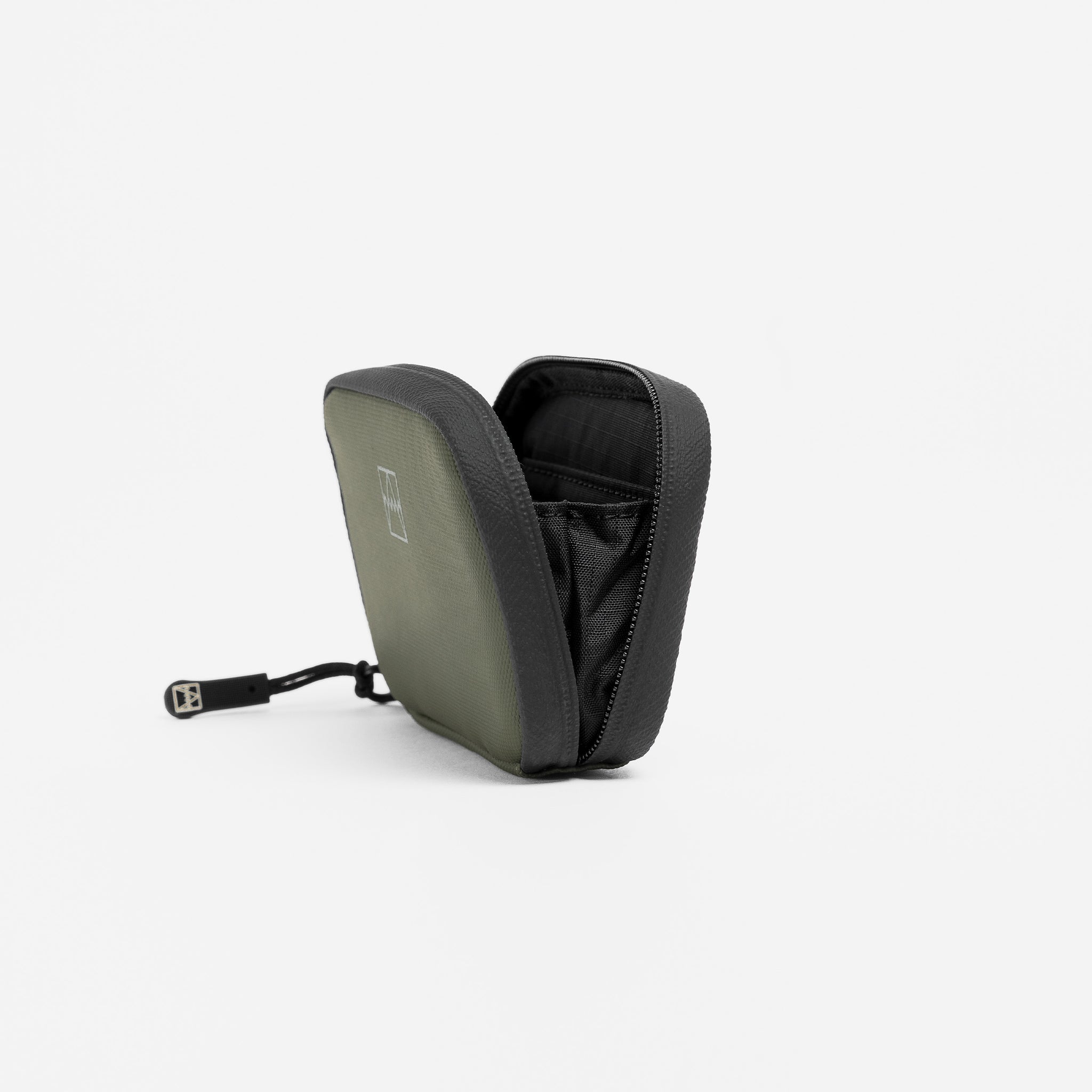 A studio shot of the end of the Wallet in Urban Green