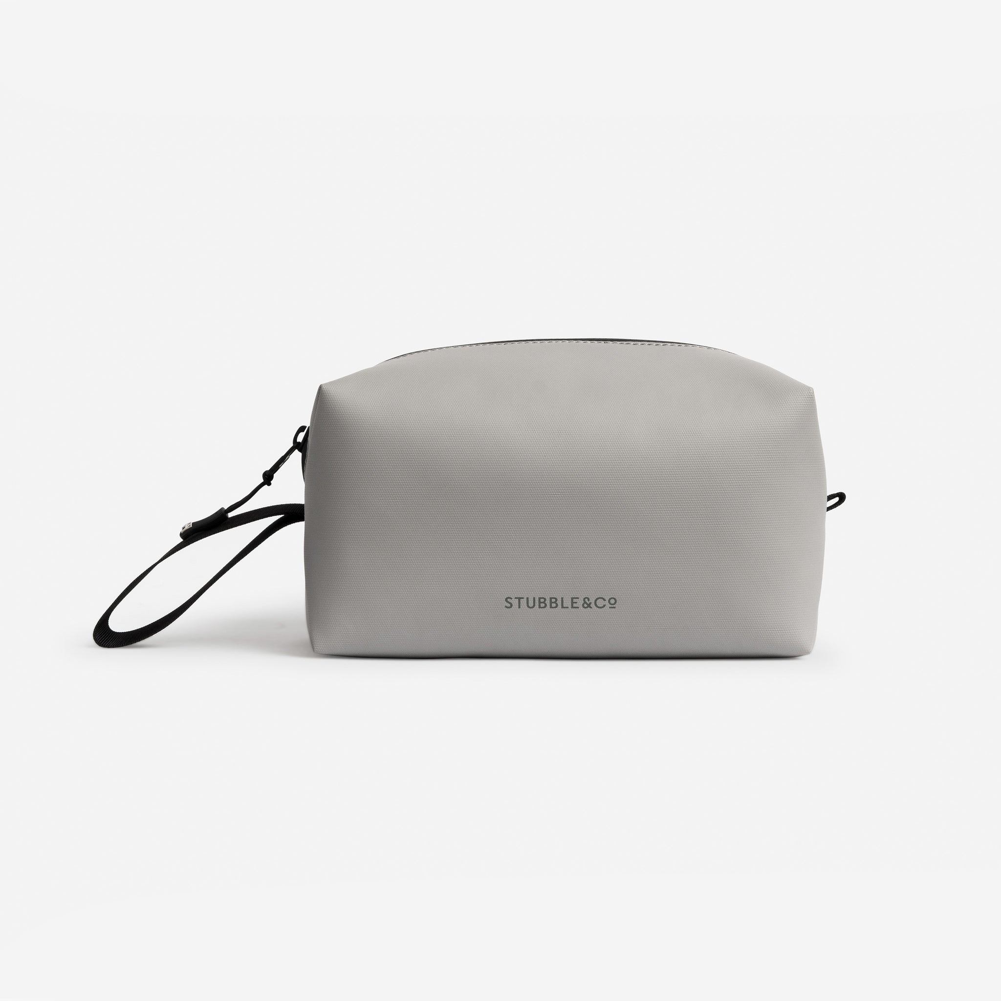 A studio shot of the back of a Concrete Wash Bag showing the reflective logo