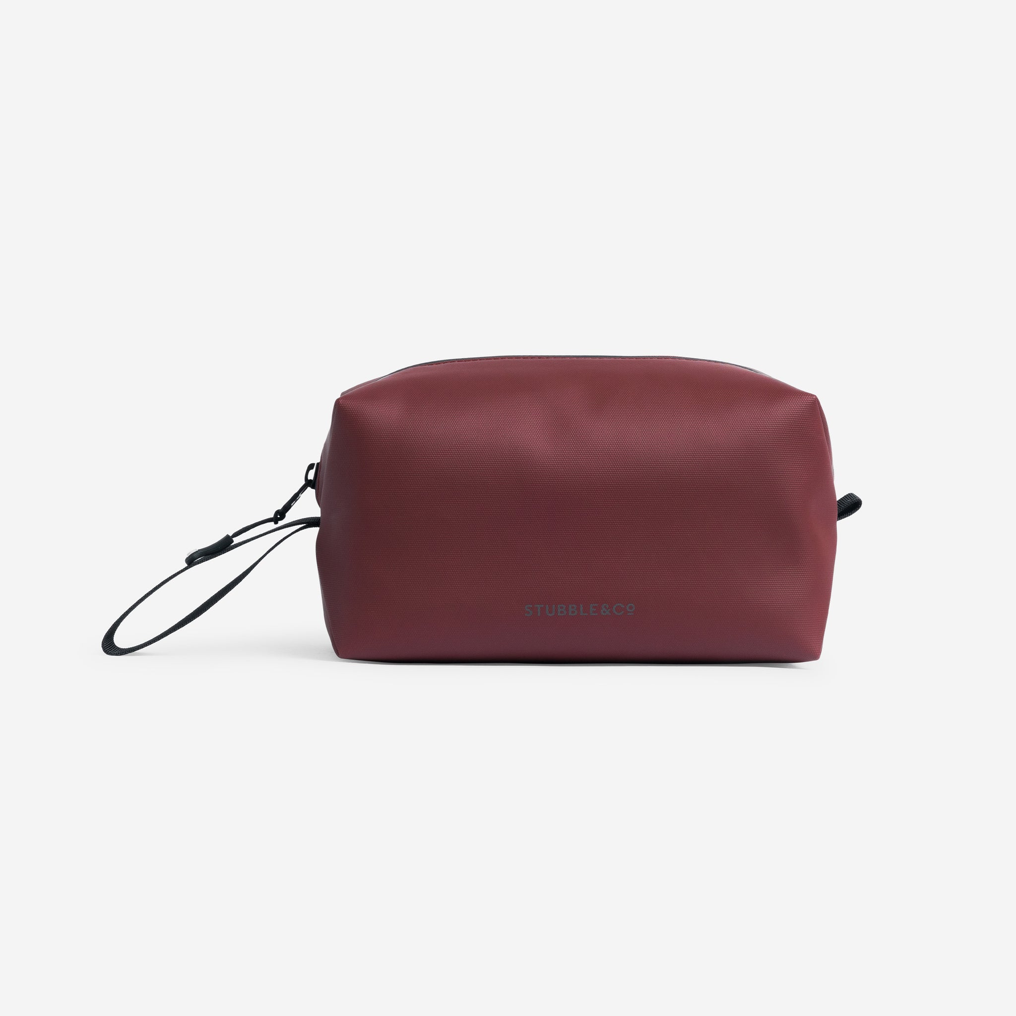 A studio shot of the back of the Garnet Red wash bag showing the reflective logo