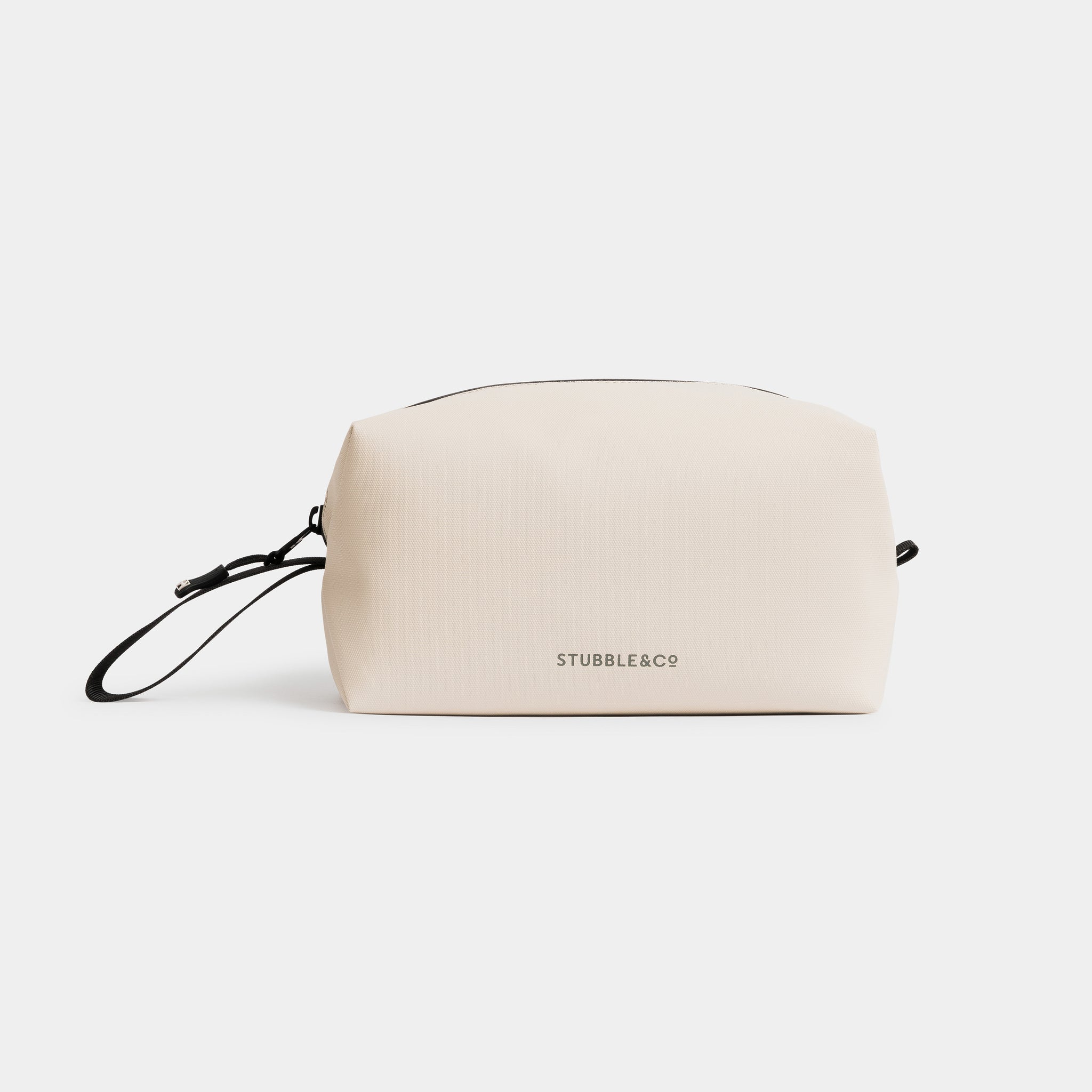 A studio shot of the back and reflective logo on the Sand Wash Bag
