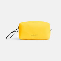 A studio shot of the back and reflective logo on a Yellow wash bag
