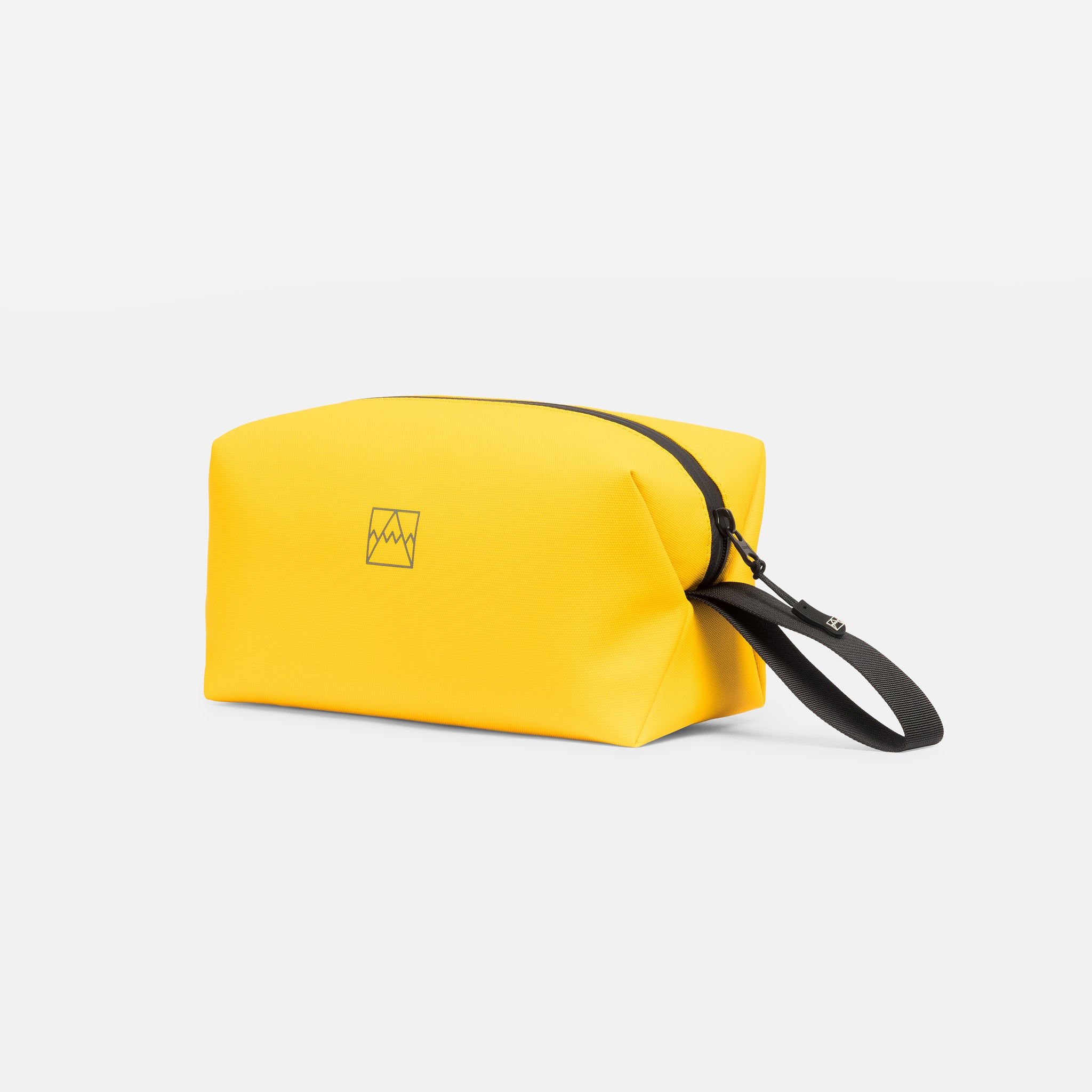 A studio shot of the Yellow Wash Bag with the logo visible