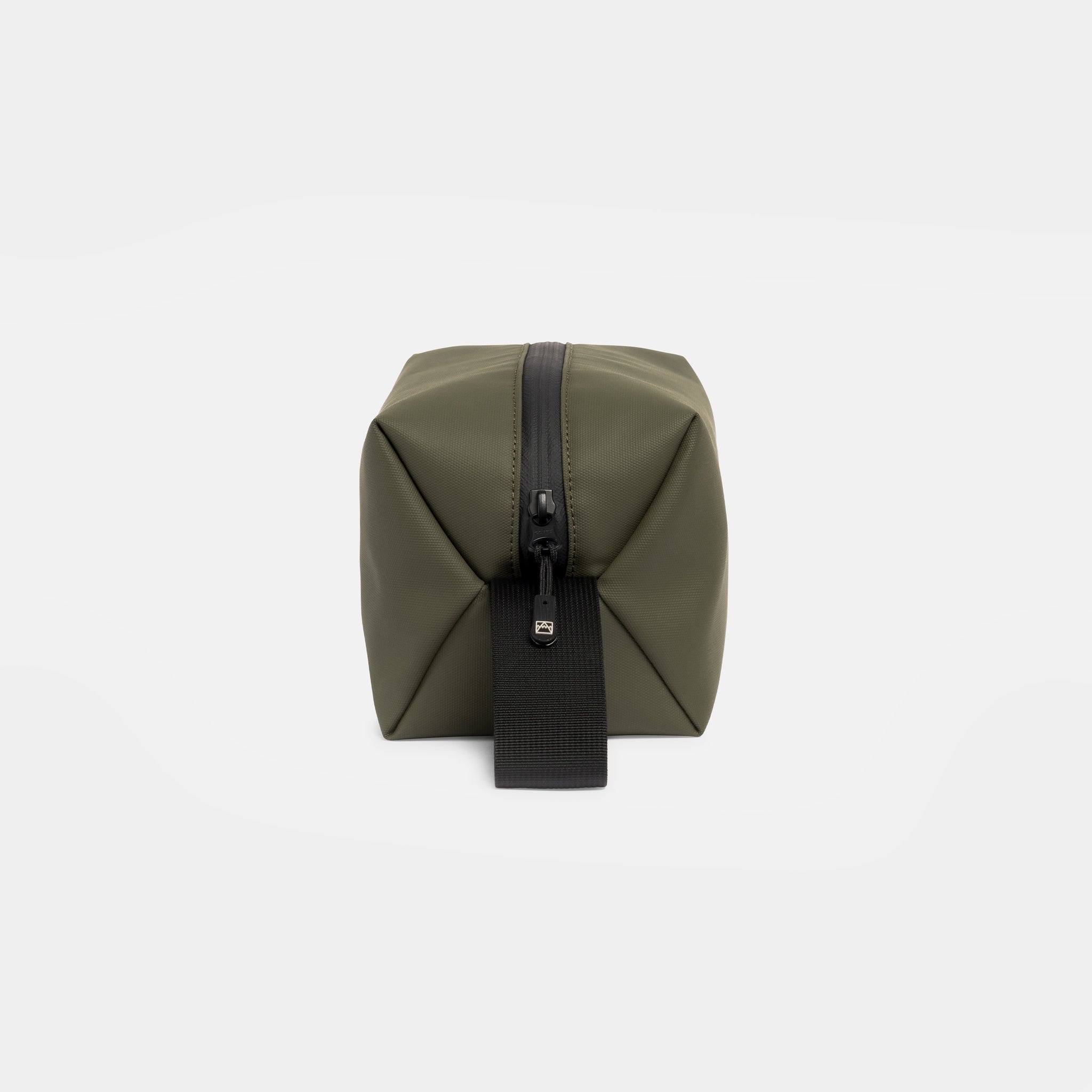 A studio shot of the end and loop hanndle of the Urban Green Wash Bag