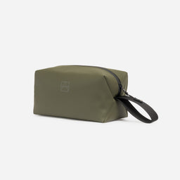 A studio shot of the front of the Urban Green Wash bag showing the reflective logo