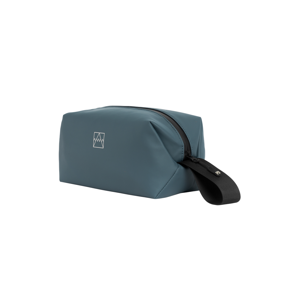 A studio shot of the front and side of a Wash Bag as cut out transparent PNG-  blue