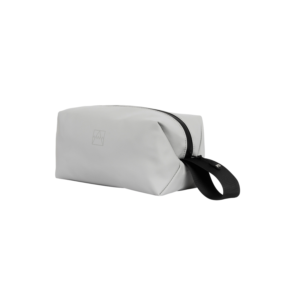 A studio shot of the front and side of a Wash Bag as cut out transparent PNG- concrete