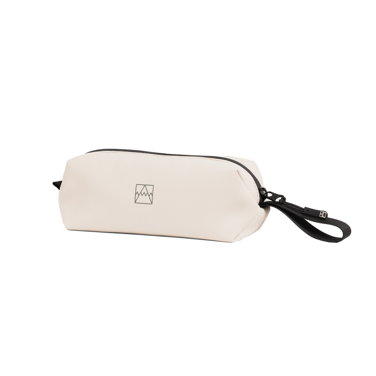 The Wash Bag Mini in Sand at a side angle