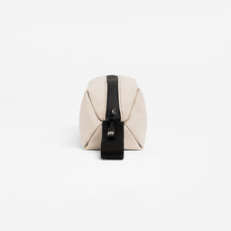 A studio shot of the loop handle and end of the Pencil Case in Sand