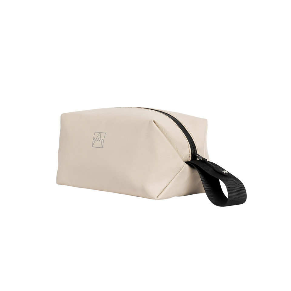 A studio shot of the front and side of a Wash Bag as cut out transparent PNG- sand