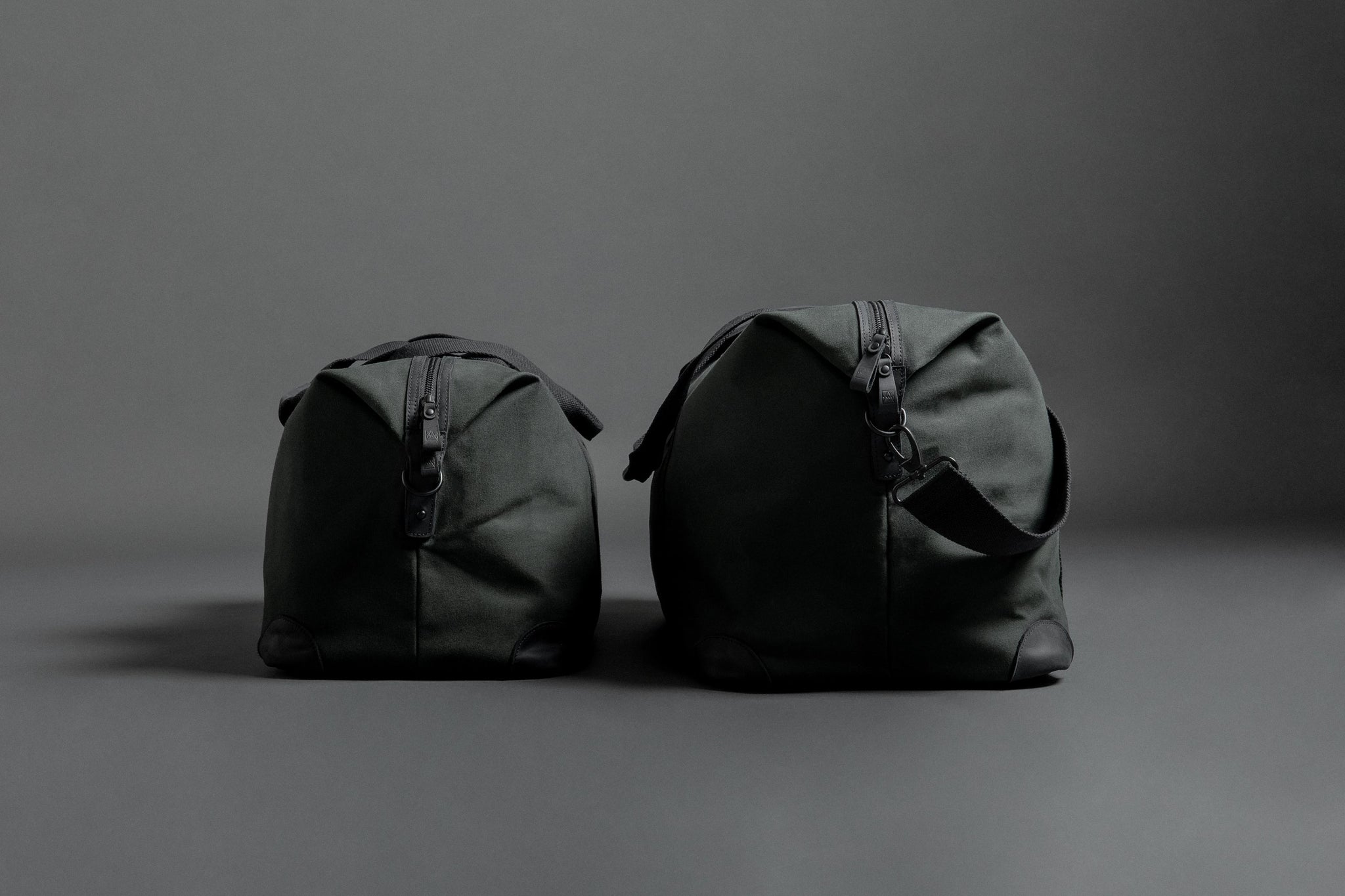 Holdall duffle bags side by side