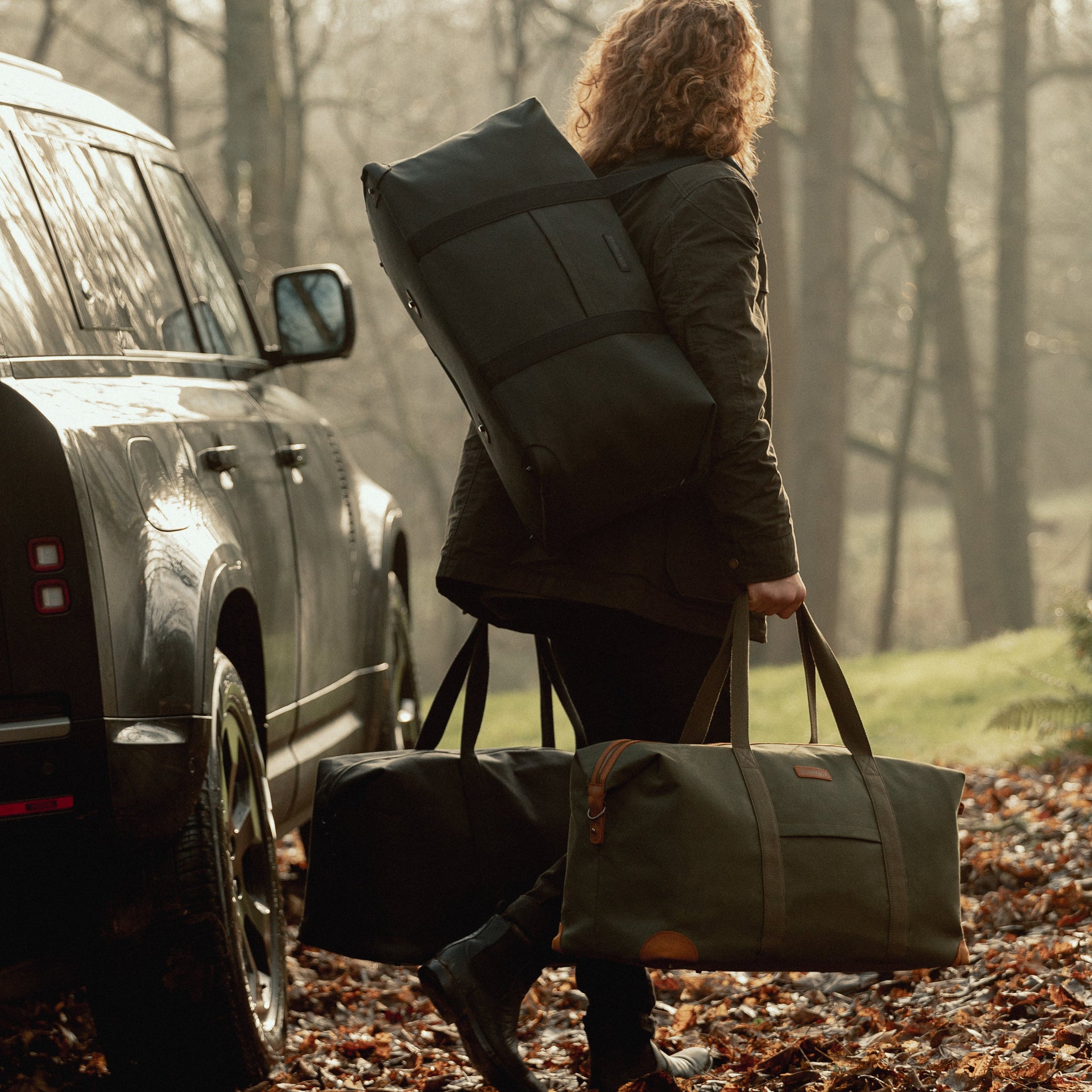 The Weekender XL duffle bag in Olive and All Black