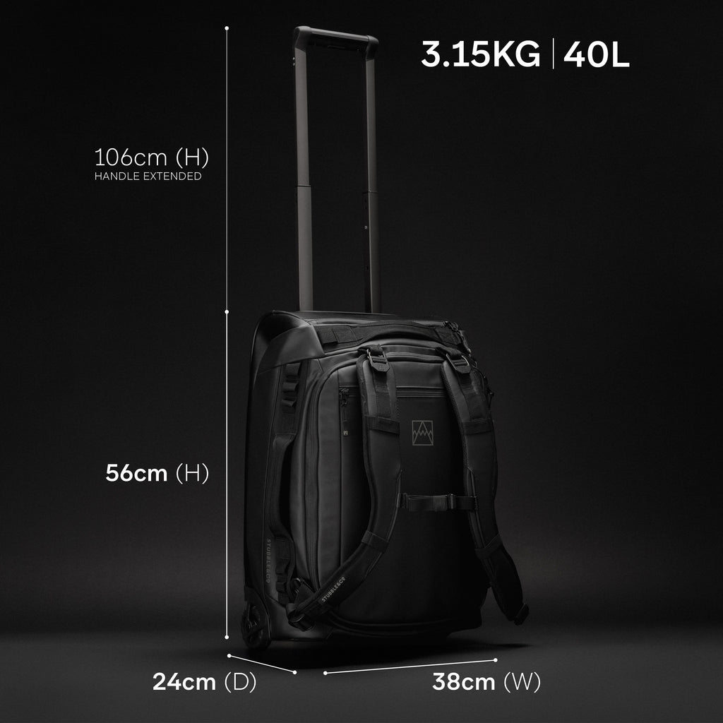 A studio shot of the Wheeled Kit Bag 40L in All Black with the dimensions, weight and capacity annotated