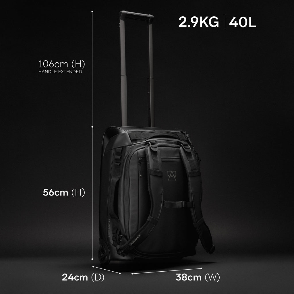 A studio shot of the Wheeled Kit Bag 40L in All Black with the dimensions annotated with capacity and weight