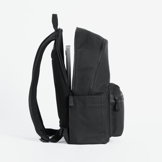 Product in All Black. Product shot from the side with laptop compartment unzipped.